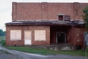 The exterior of an abandoned warehouse in rural Illinois, where the following images were first shown. After gaining access, I spent several months renovating and wiring the interior for lights.
